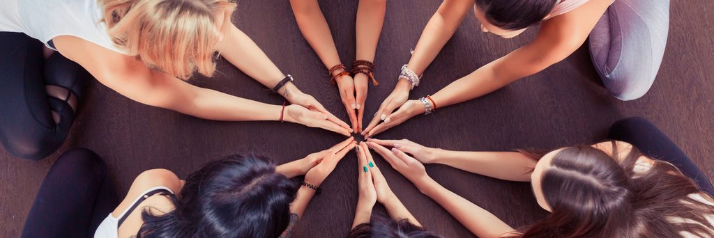 hands in middle 500x167